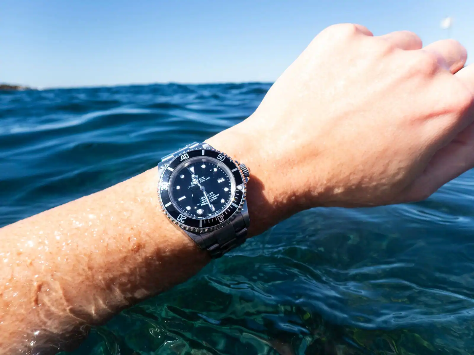 Rolex Sea-Dweller 16600 on wrist in ocean